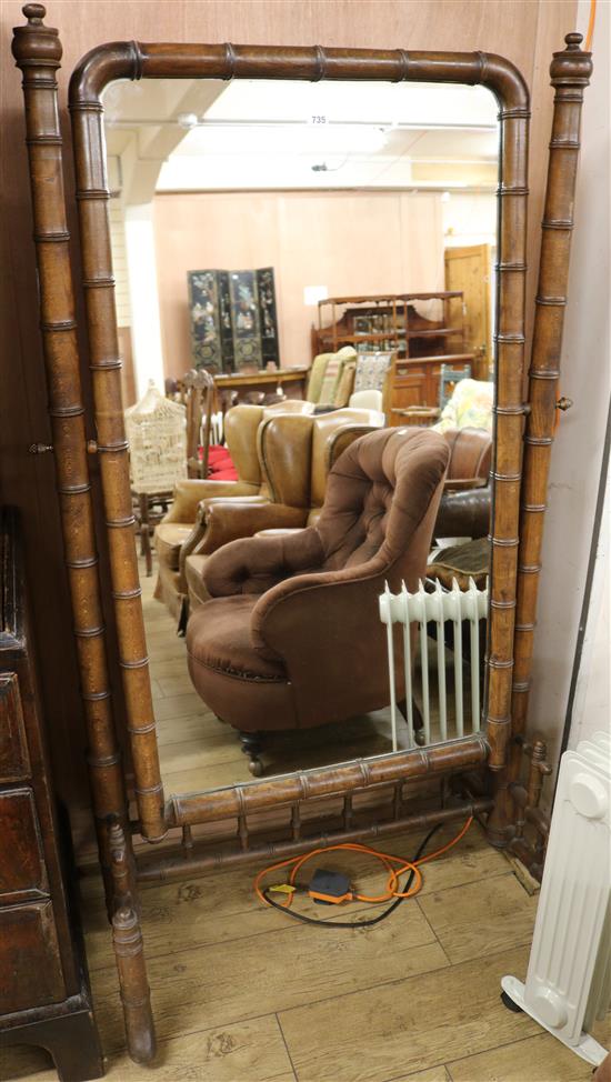 A 19th century French beech simulated bamboo cheval glass, W.95cm H.166cm